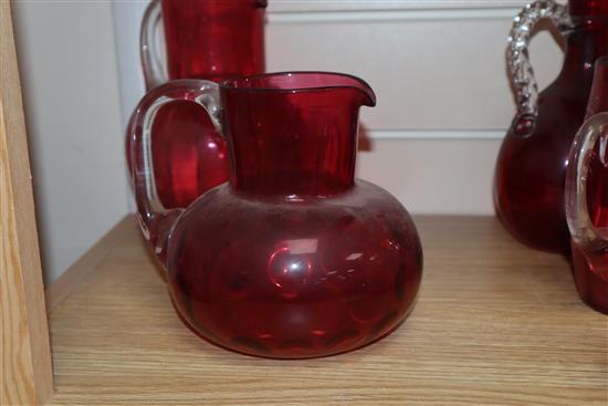 A collection of cranberry and Mary Gregory style glass (11)